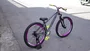 BICICLETA ABSOLUTE BRUTUS ARO 26" - CINZA, ROXO E AMARELO NEON COM FREIO HIDRÁULICO SHIMANO