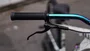 BICICLETA HUPI NAJA ARO 26 - BRANCA E OIL SLICK COM FREIO A DISCO HIDRÁULICO SHIMANO